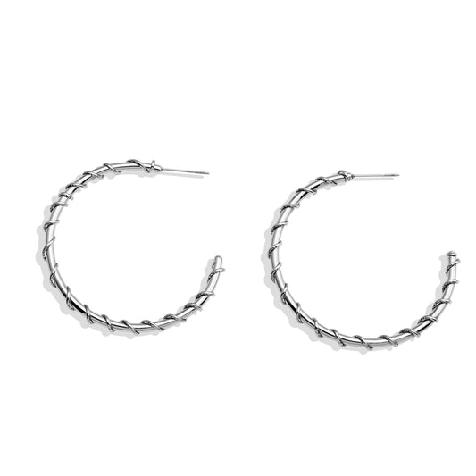 ELNA Silver Hoop Earrings with a Decorative Twist
