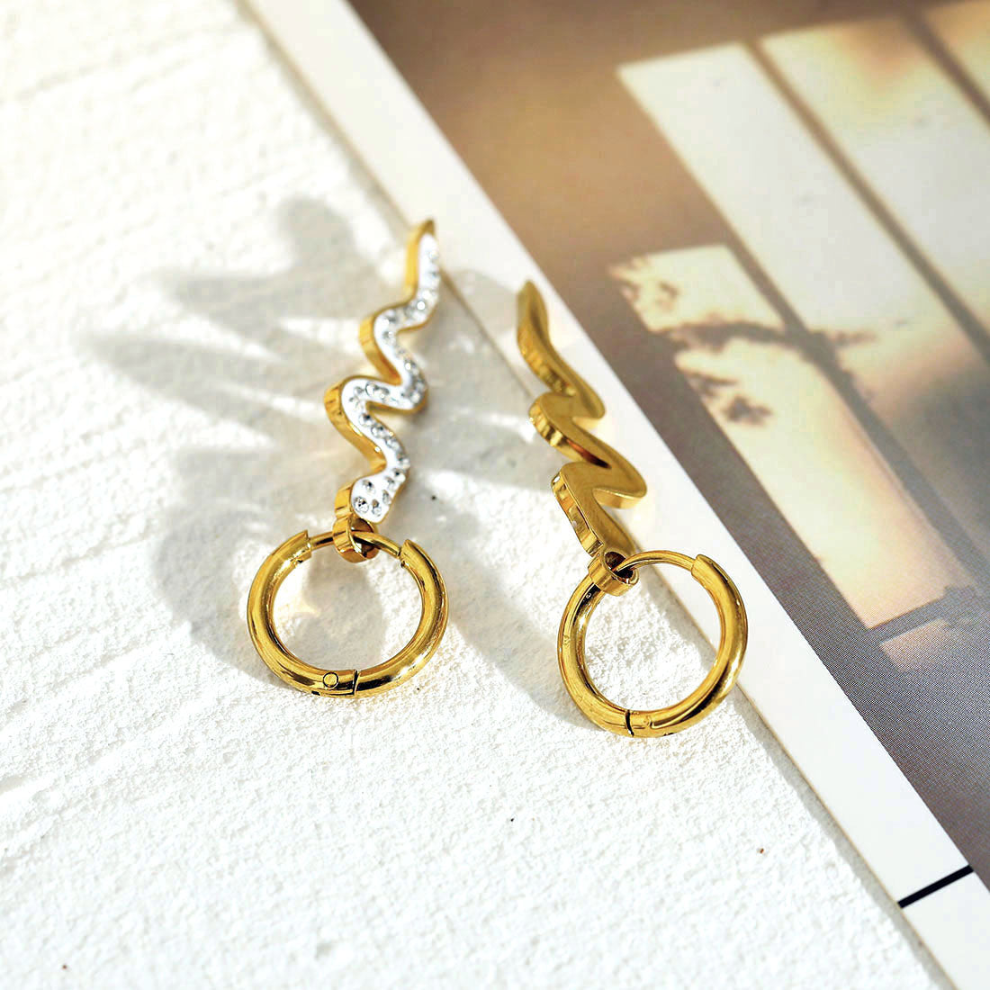 FANG: Zirconia Embedded Serpent Drop Earrings