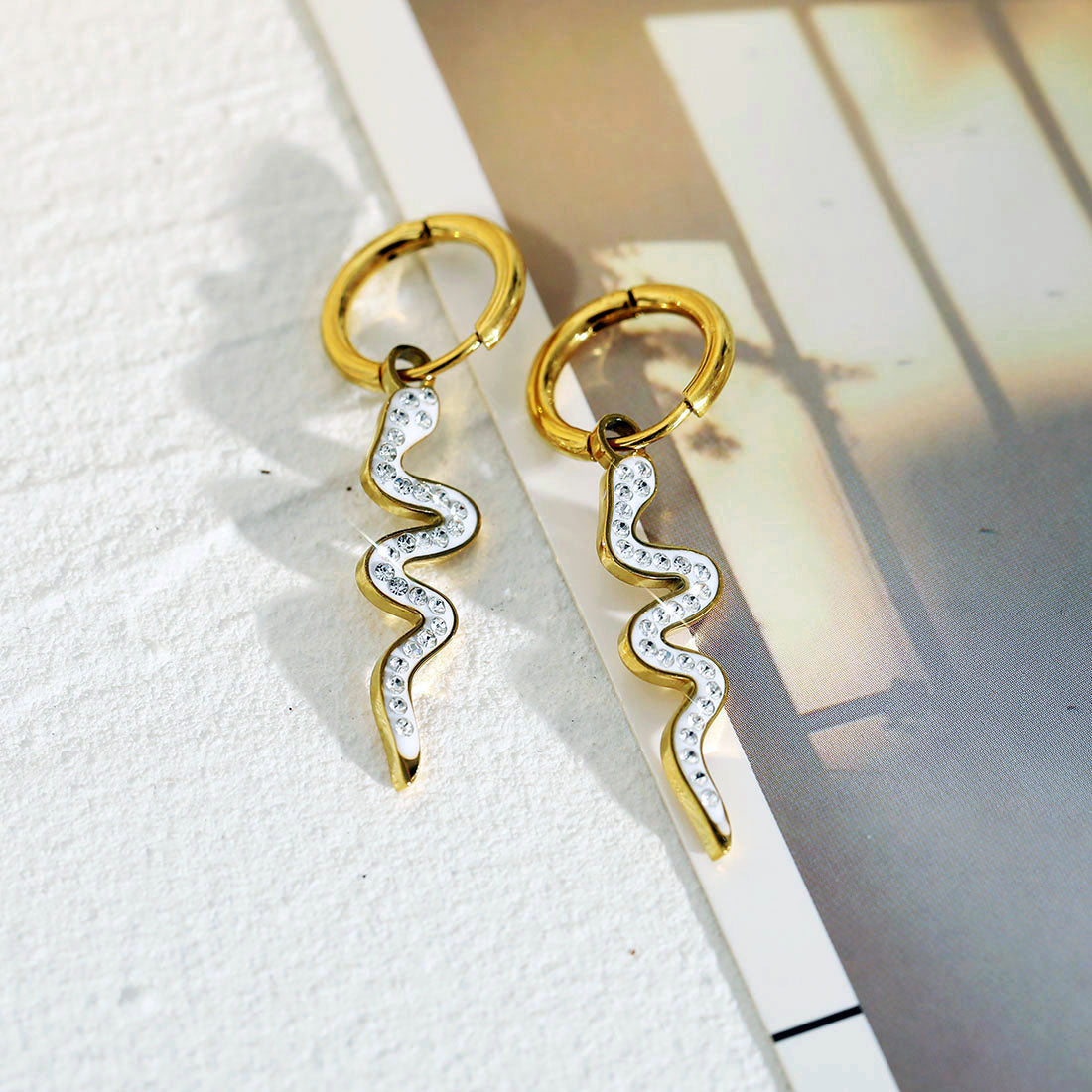 FANG: Zirconia Embedded Serpent Drop Earrings