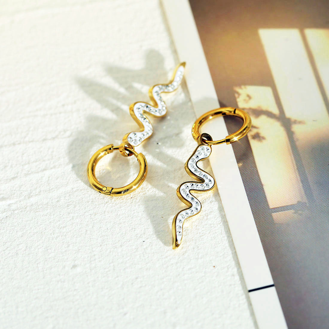 FANG: Zirconia Embedded Serpent Drop Earrings