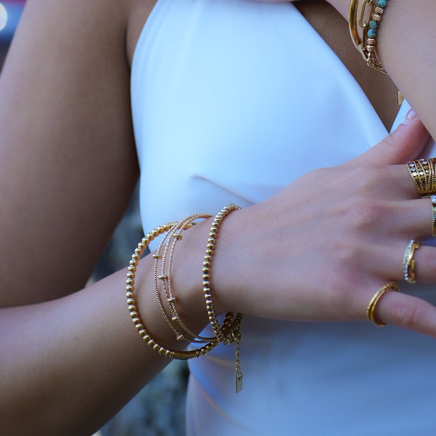 Style FARZIKA Gold: Triple Stacked Textured Beaded Bracelet