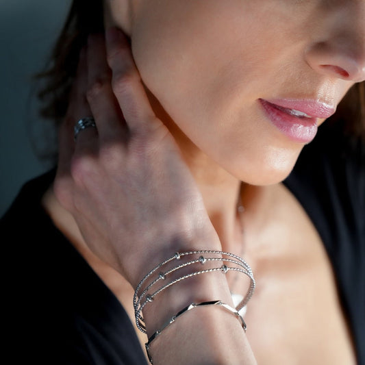 Style FARZIKA Silver: Triple Stacked Textured Beaded Bracelet