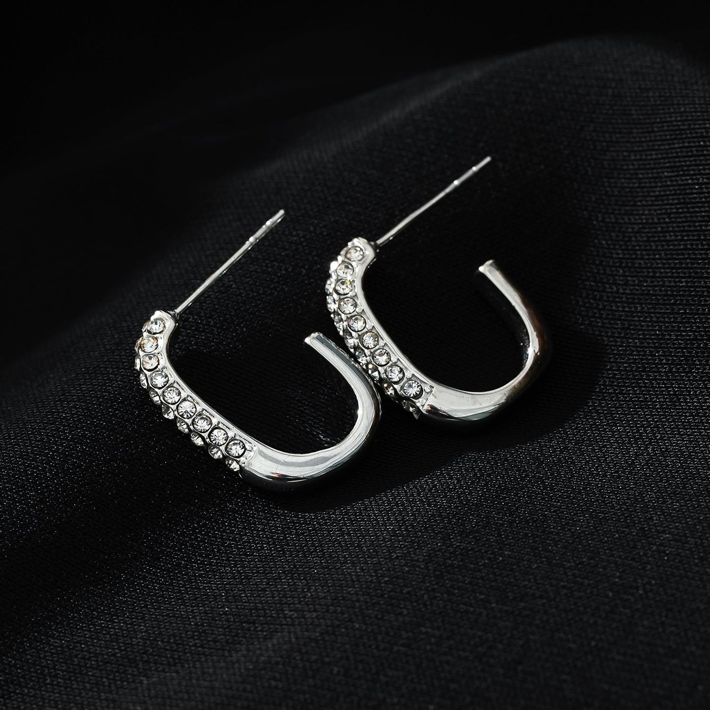 FIRLE Silver (White Gold): Partial Pavé Zirconia Oval Hoop Earrings