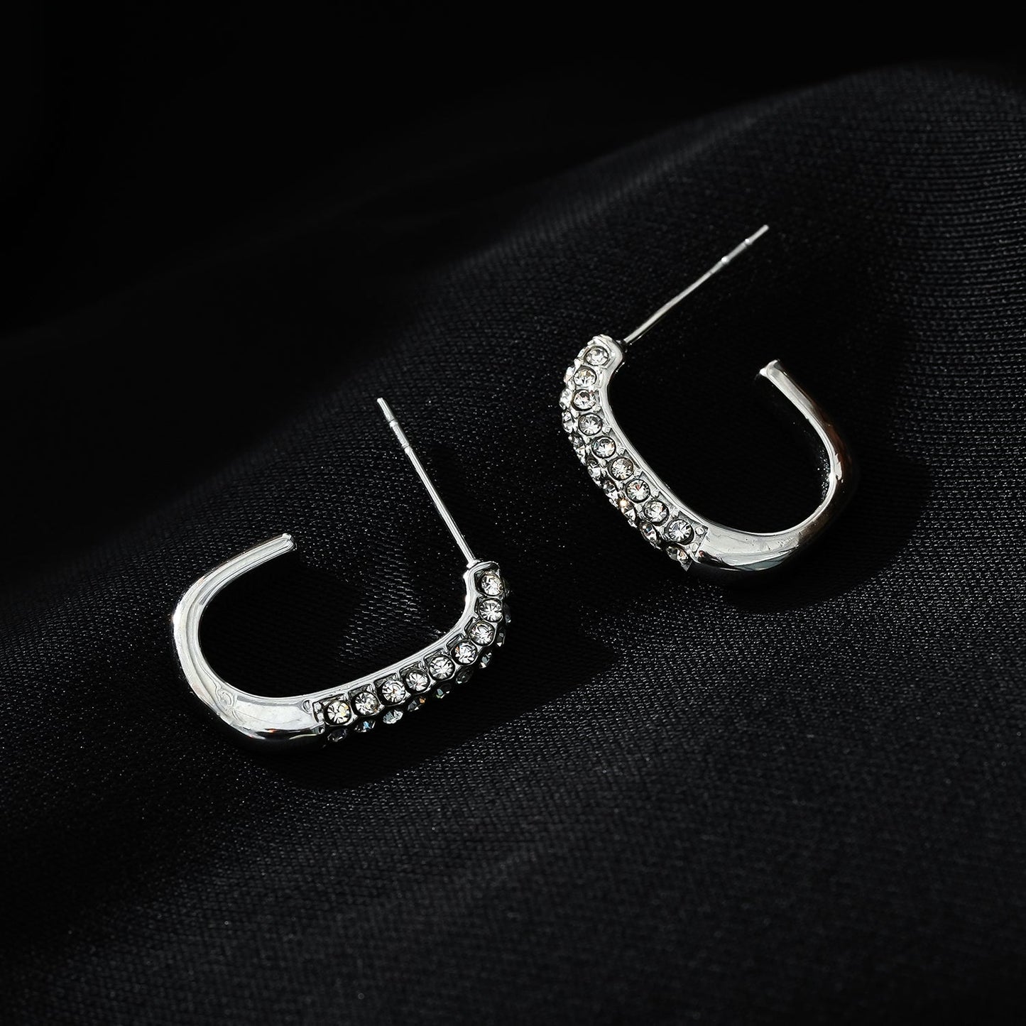 FIRLE Silver (White Gold): Partial Pavé Zirconia Oval Hoop Earrings