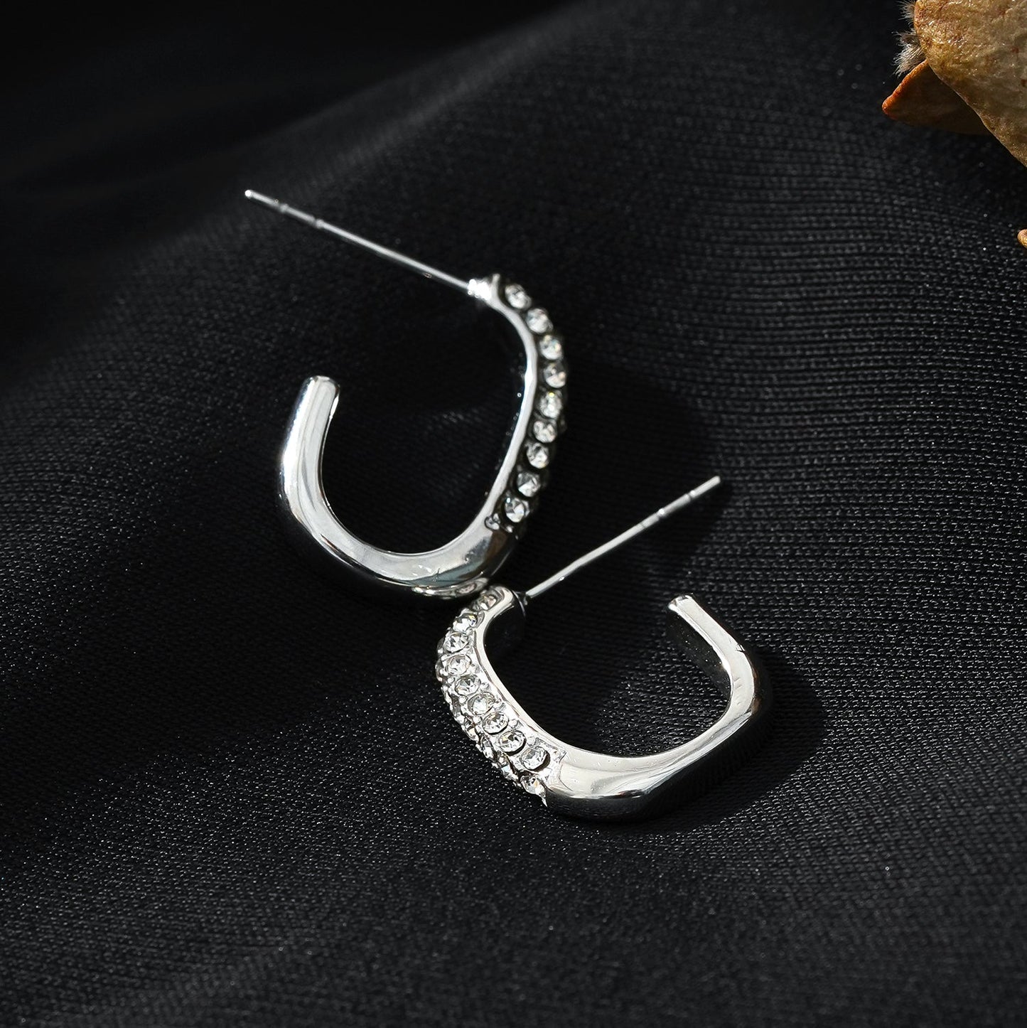 FIRLE Silver (White Gold): Partial Pavé Zirconia Oval Hoop Earrings