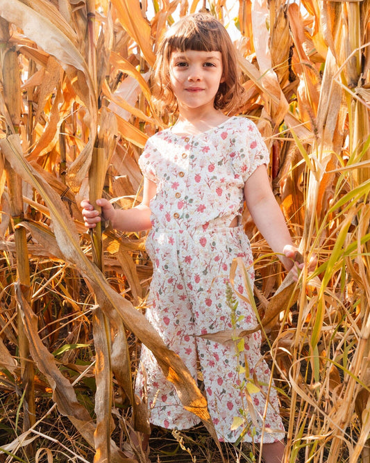 Printed Seersucker Jumpsuit With Cut Outs Pink Flowers On Cream Background
