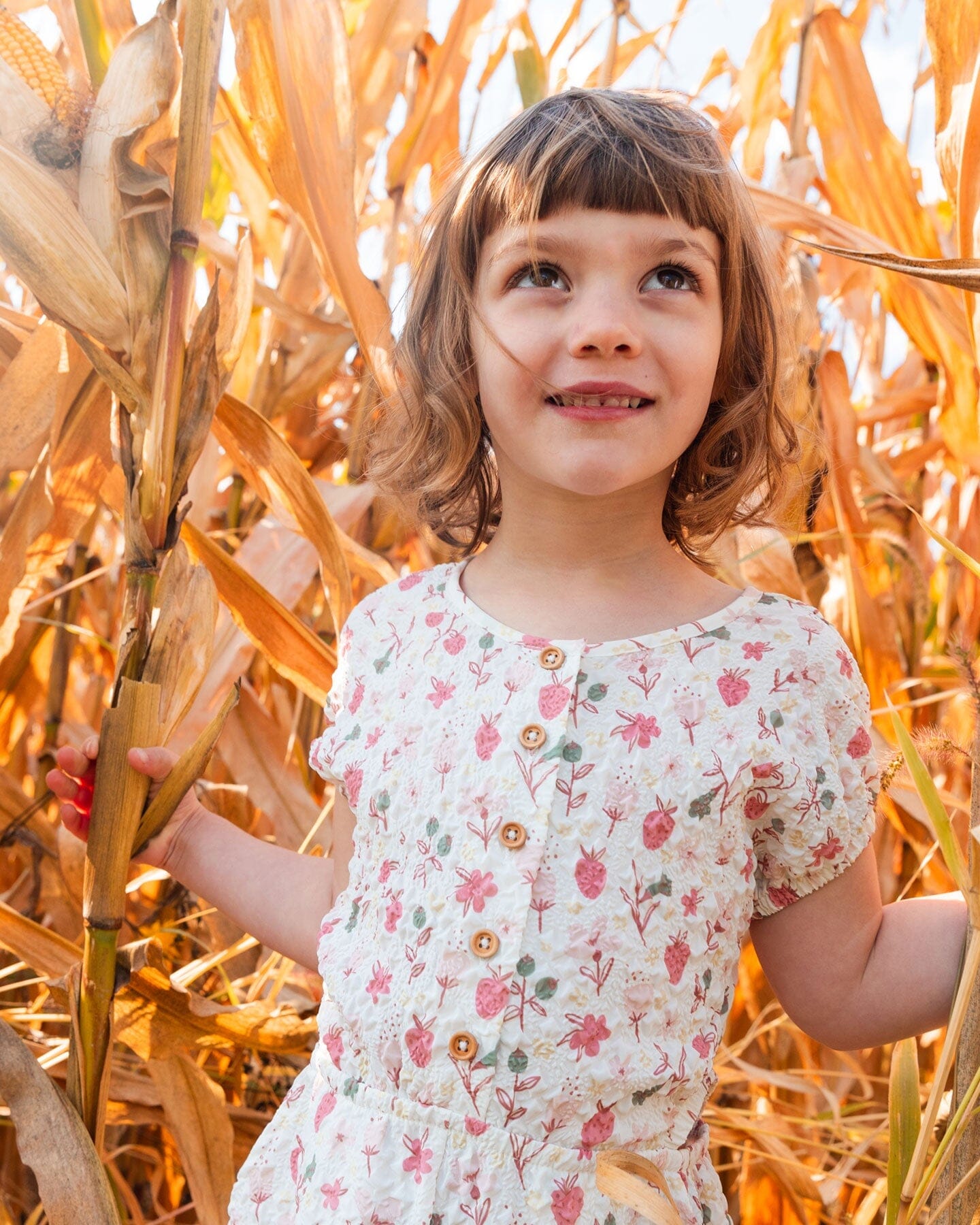Printed Seersucker Jumpsuit With Cut Outs Pink Flowers On Cream Background