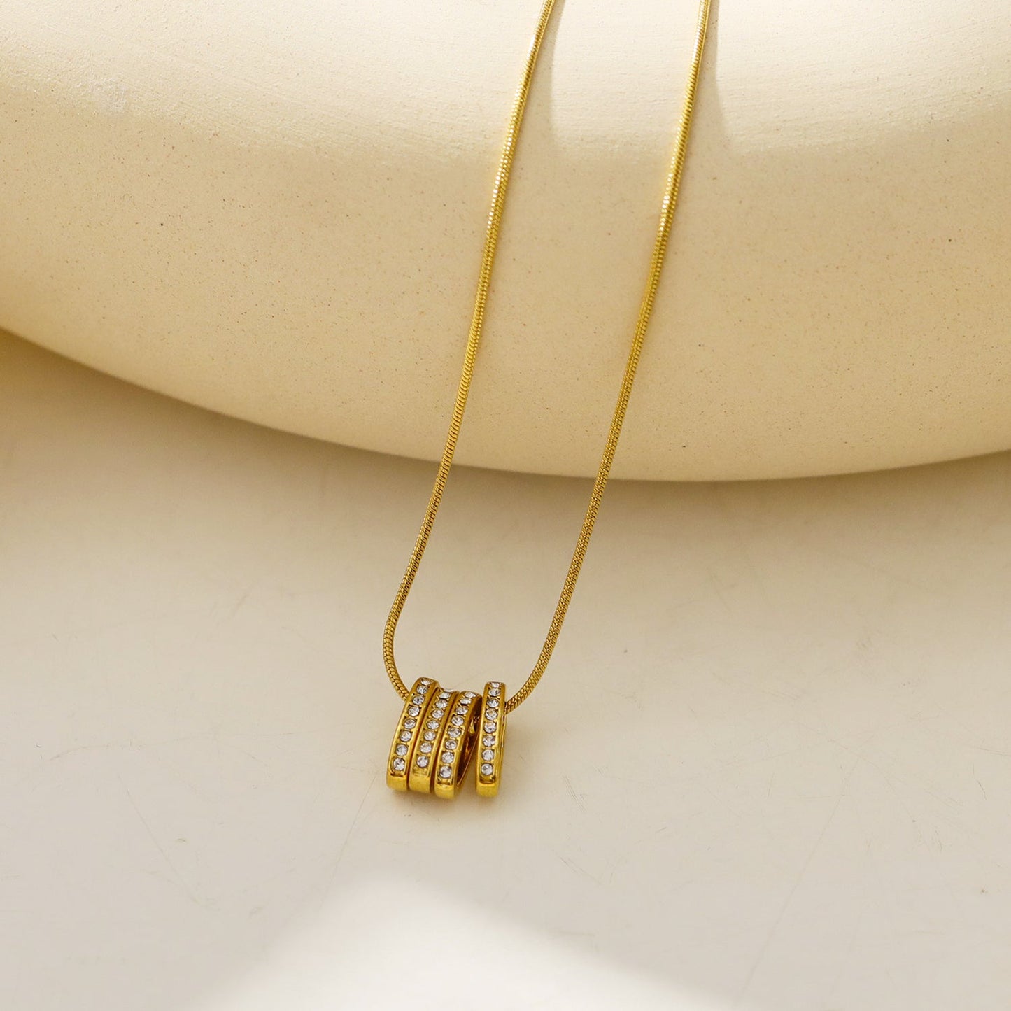 GARNA Gold: Mini Snake-Skin Chain with Zirconia-Adorned Oval Shaped Charms