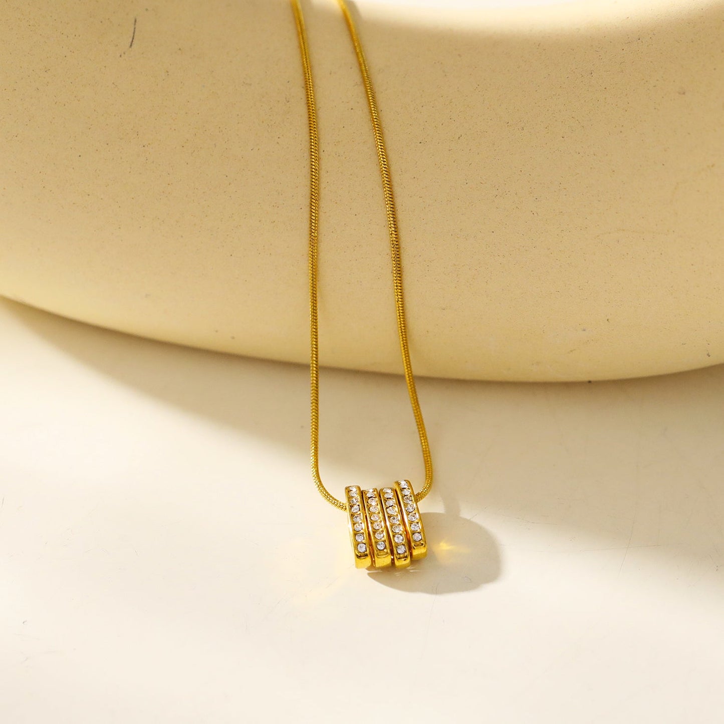 GARNA Gold: Mini Snake-Skin Chain with Zirconia-Adorned Oval Shaped Charms