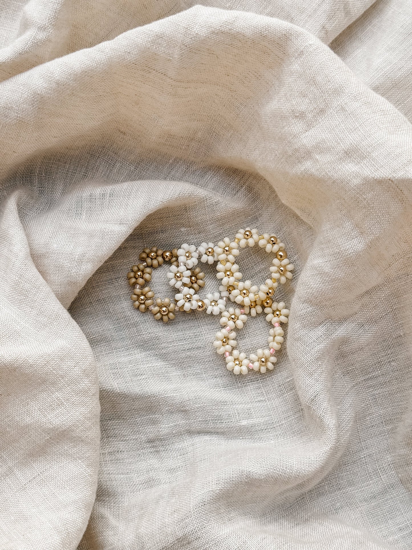 The Daisy Chain Ring Collection