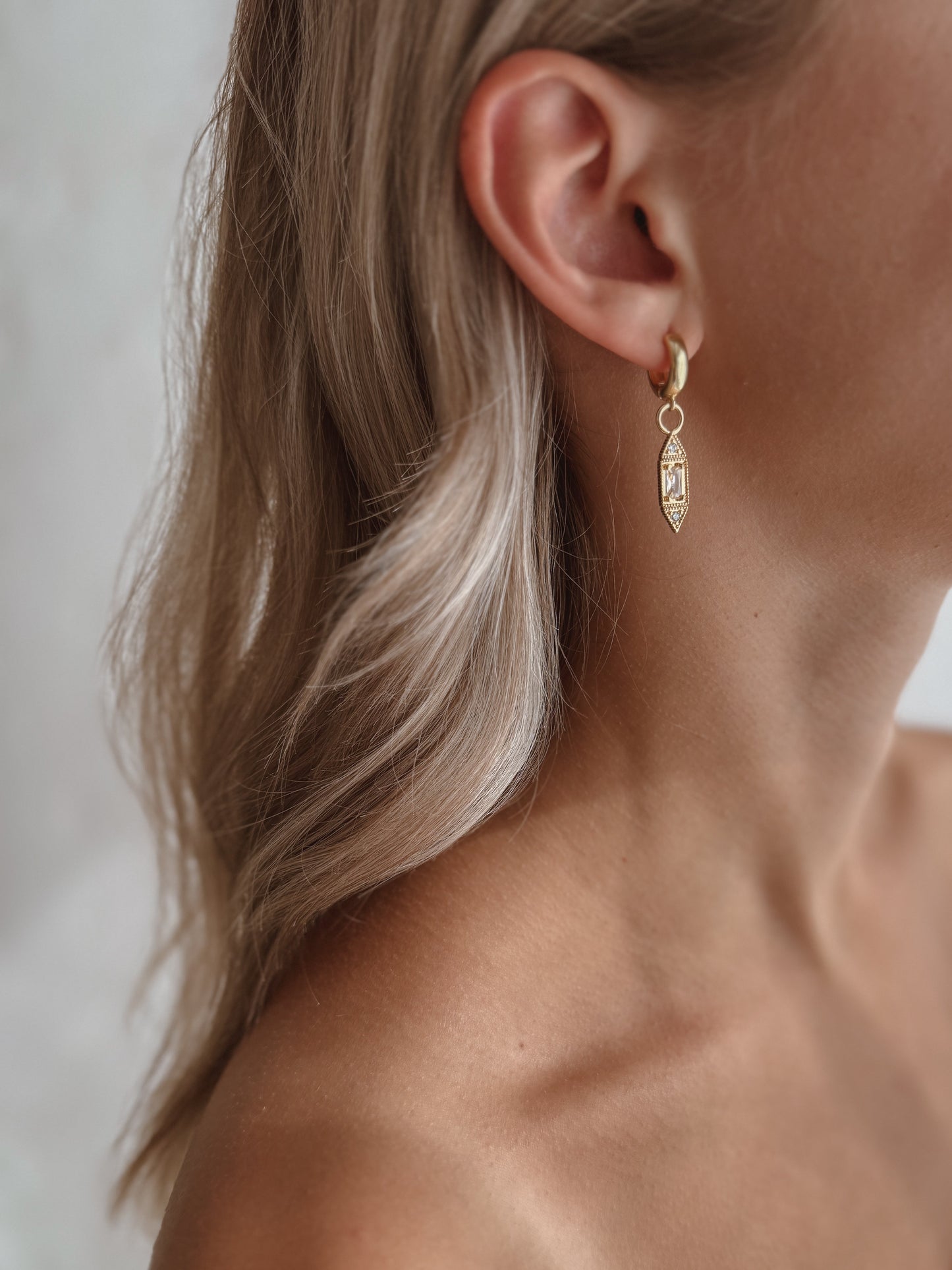 The Celeste Huggie Hoop Earrings
