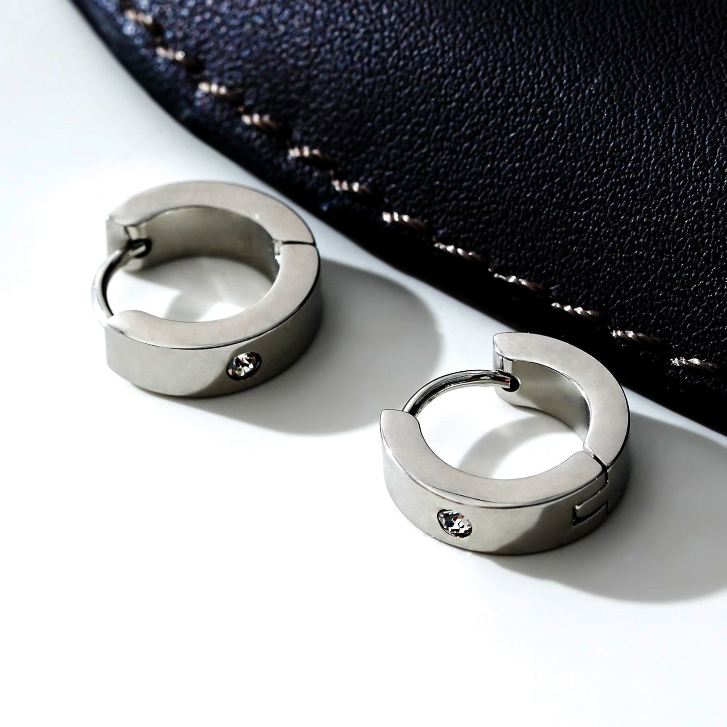 INIS: Wide Mini Hoop Earrings with a Solitaire Zirconia Gemstone in Silver