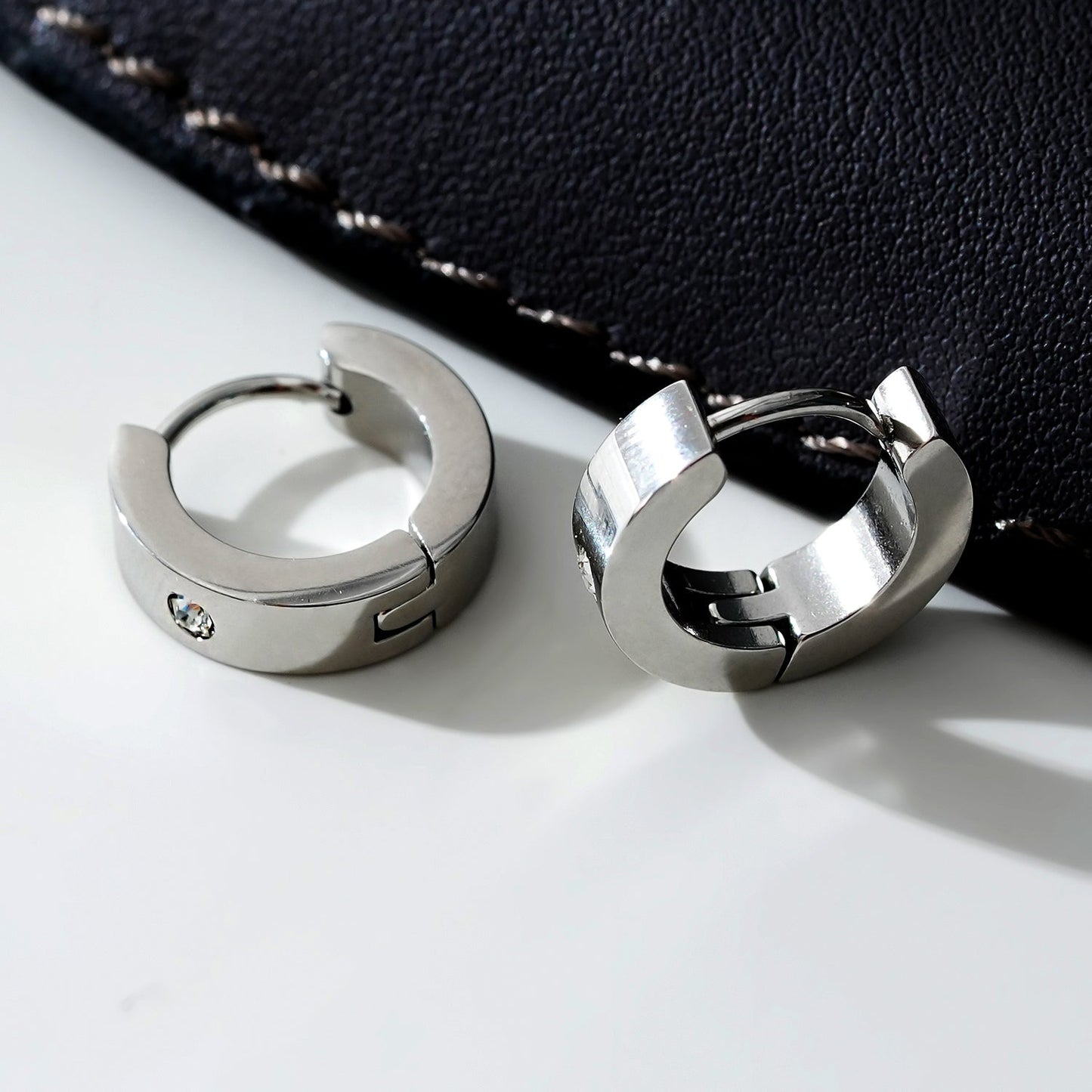 INIS: Wide Mini Hoop Earrings with a Solitaire Zirconia Gemstone in Silver