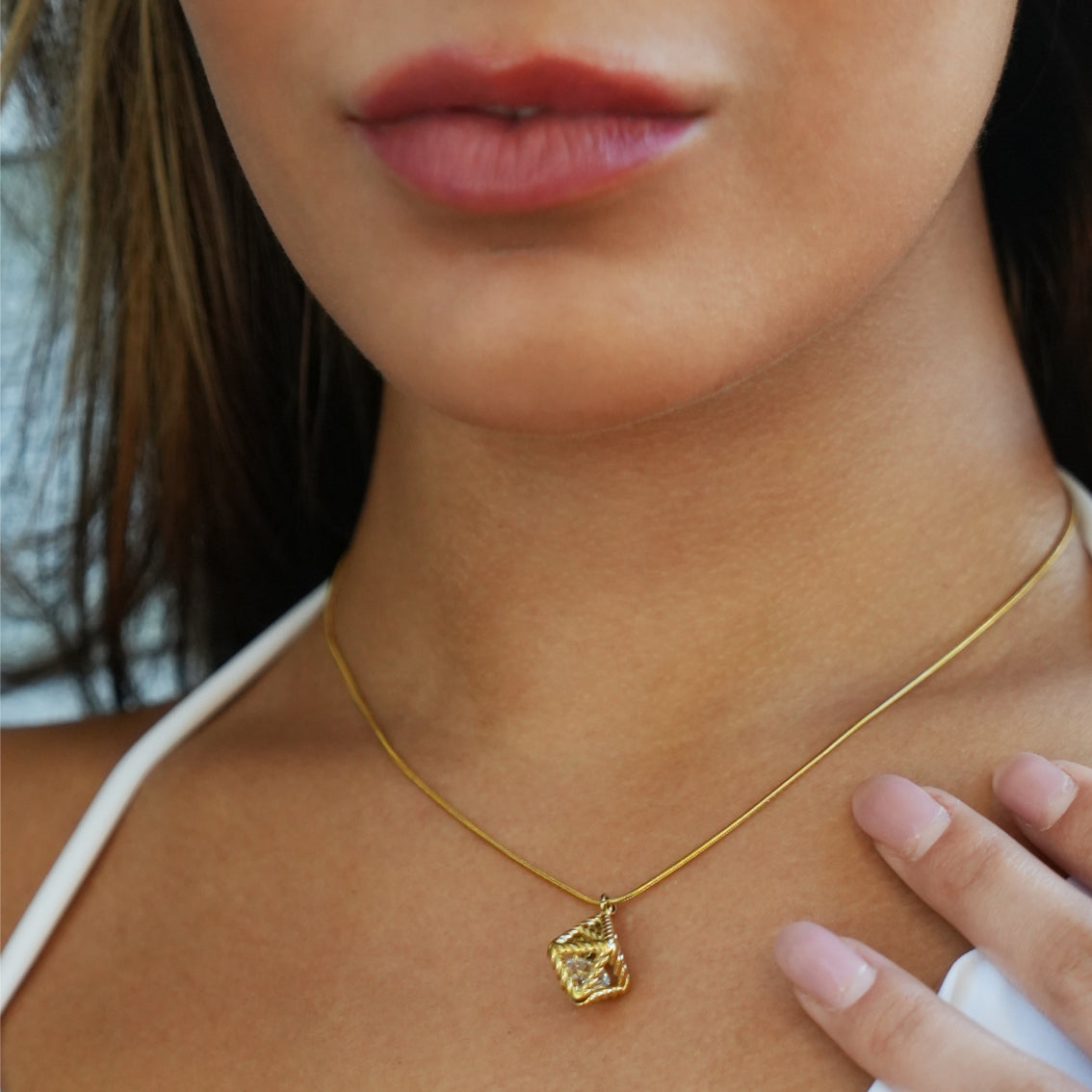 Style KARJAT: Gold Chain Necklace with Geometric Caged Zirconia Pendant