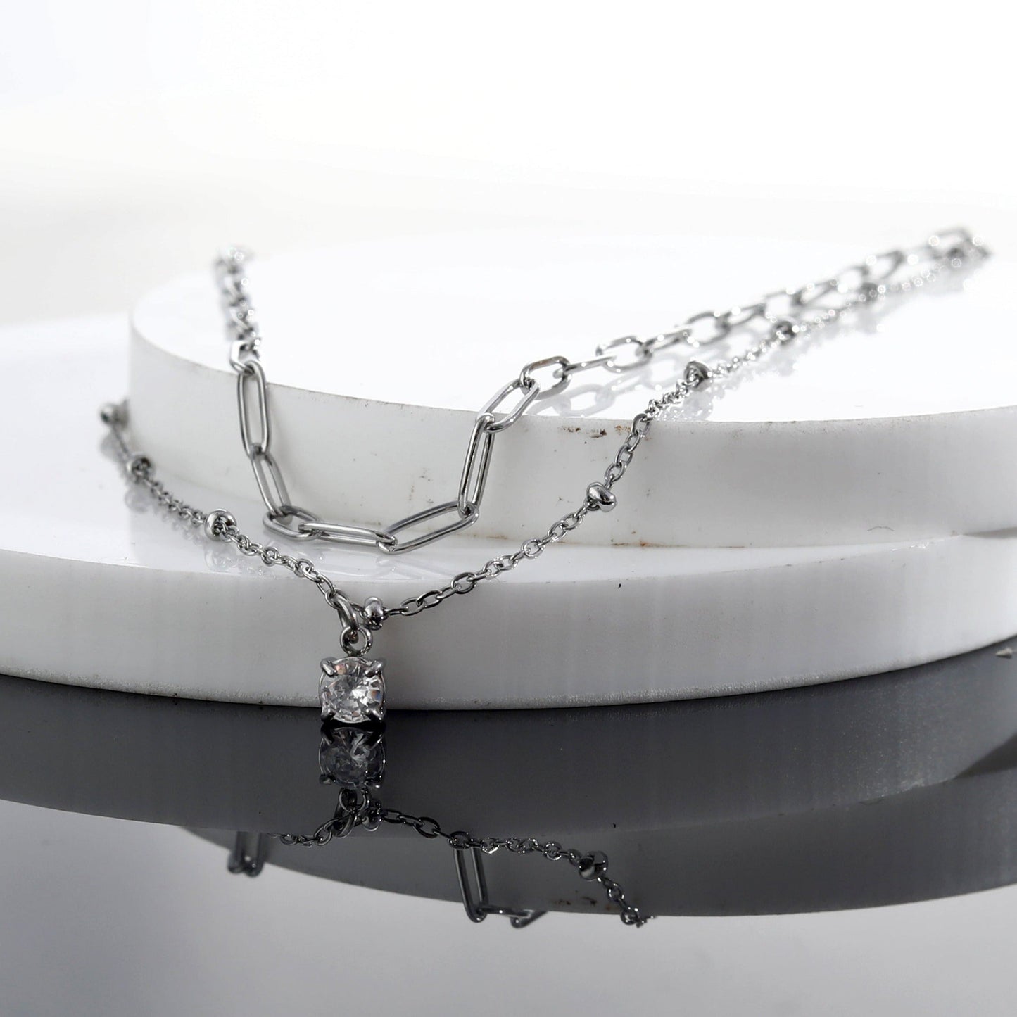 KATERI Silver: Pre-Layered Chains Necklace with a Solitaire Zirconia Charm Pendant