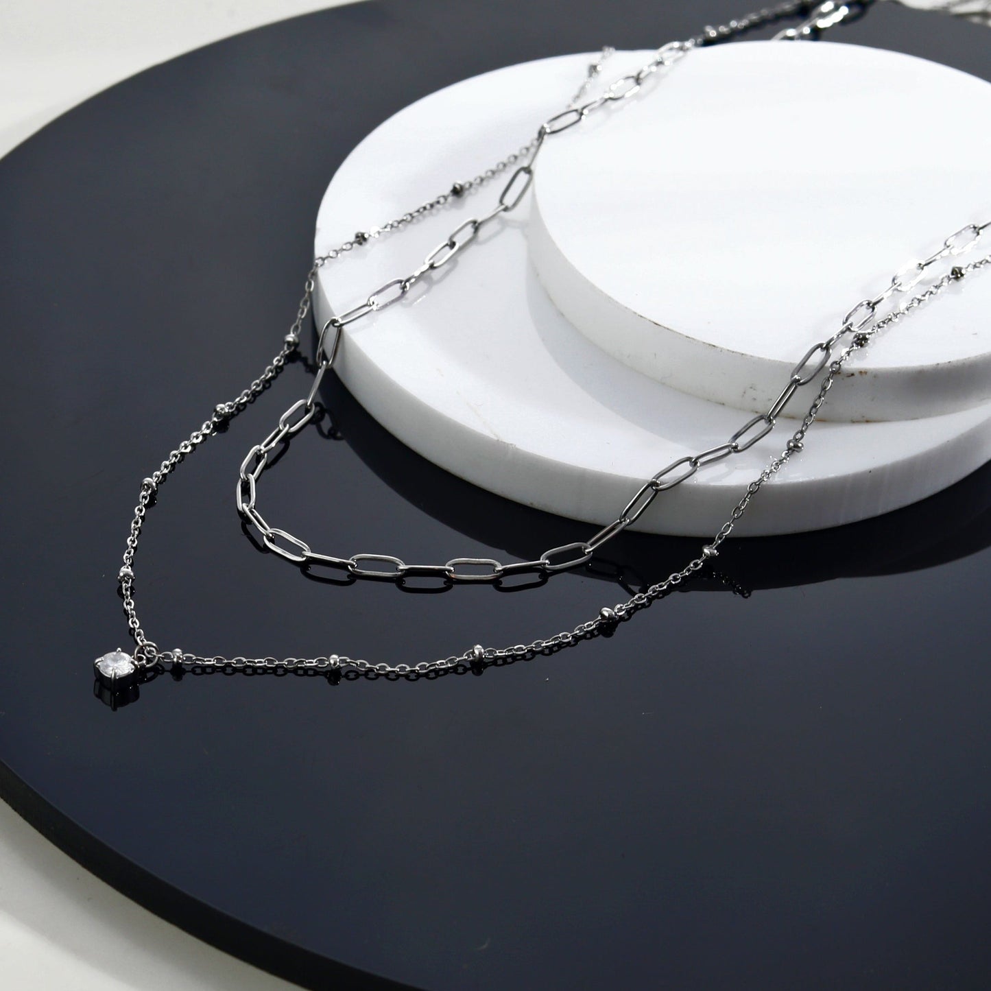 KATERI Silver: Pre-Layered Chains Necklace with a Solitaire Zirconia Charm Pendant