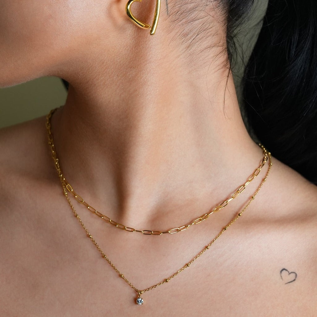 KATERI Gold: Pre-Layered Chains Necklace with a Solitaire Zirconia Charm Pendant