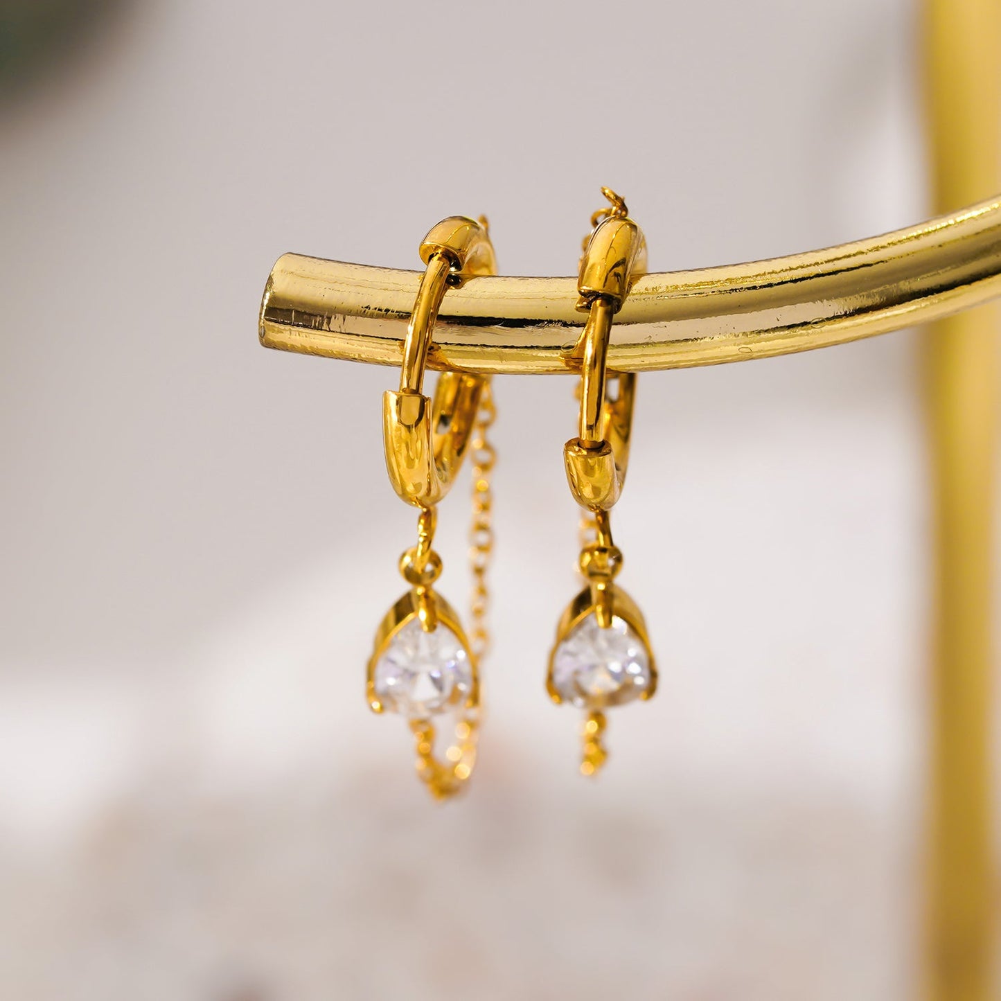 KAZUKA: Hoop Earrings with Pear-Shaped Zirconia Charm and Dainty Chain