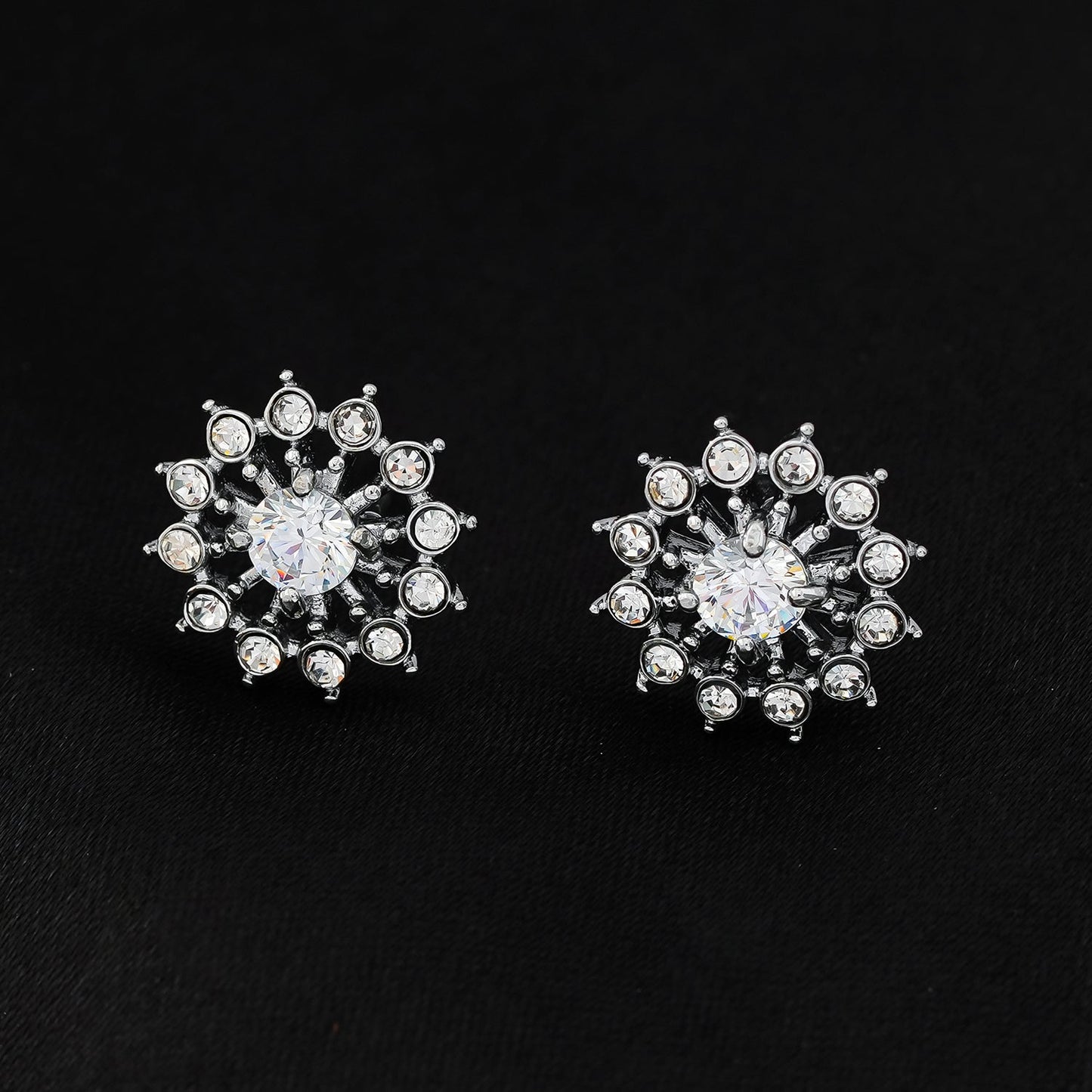 KERELA White Gold (Silver Toned): Shimmering Star Zirconia Stud Earrings