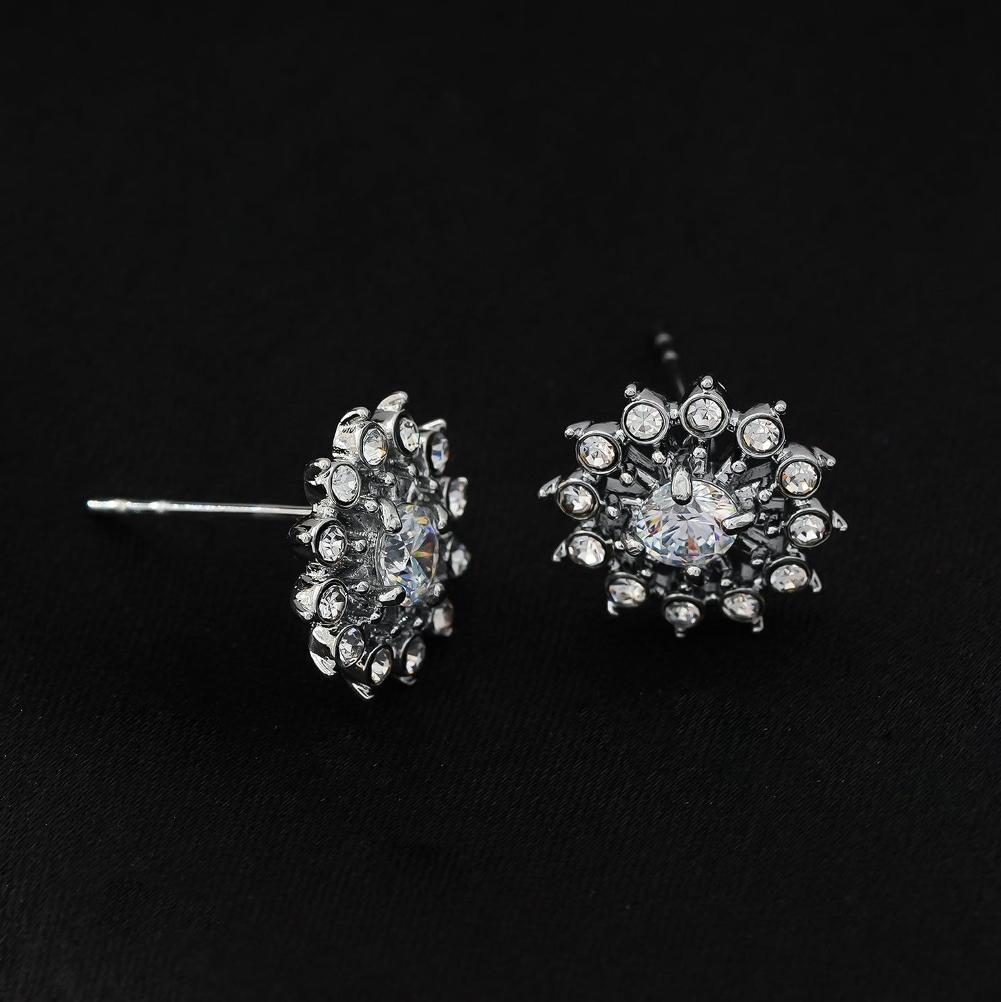KERELA White Gold (Silver Toned): Shimmering Star Zirconia Stud Earrings