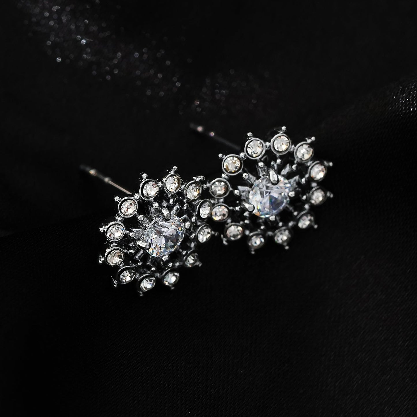 KERELA White Gold (Silver Toned): Shimmering Star Zirconia Stud Earrings