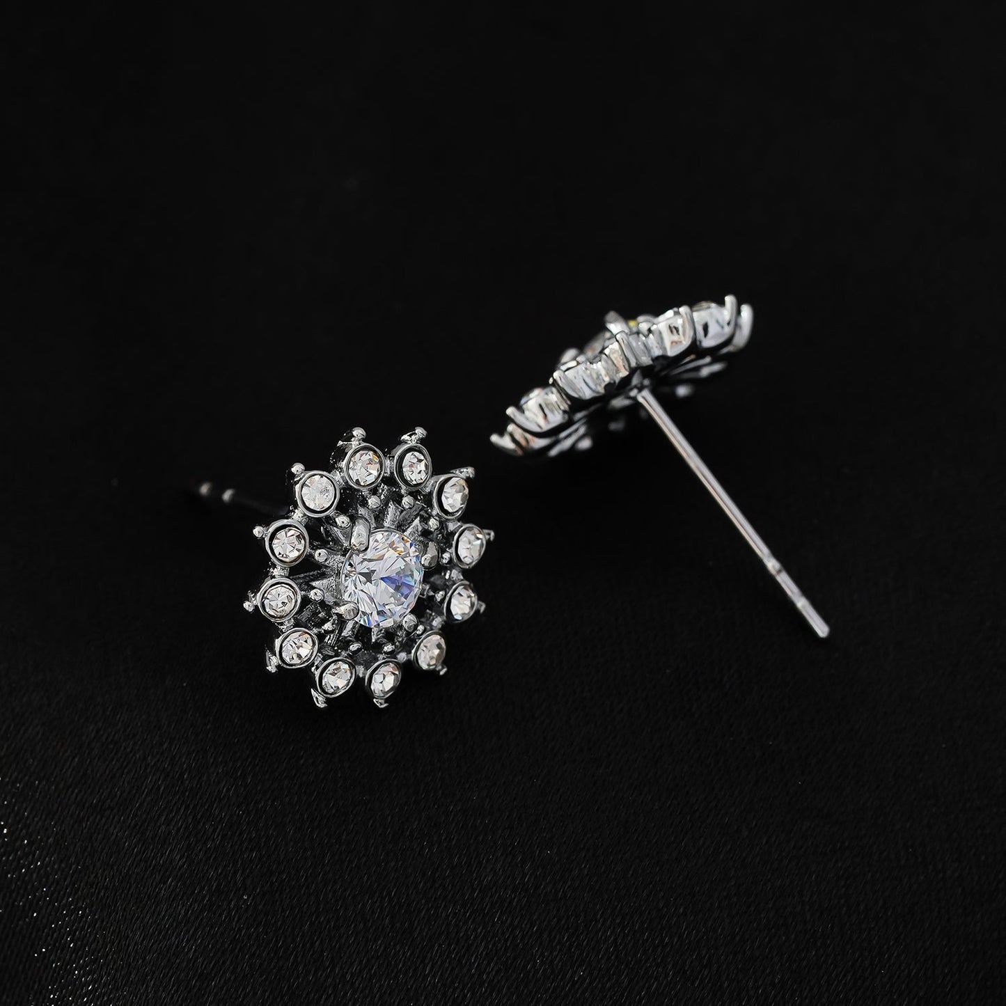 KERELA White Gold (Silver Toned): Shimmering Star Zirconia Stud Earrings