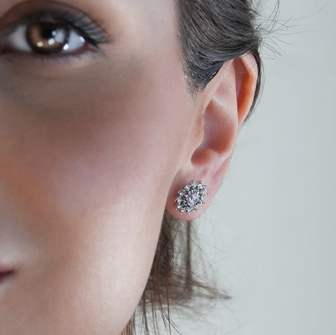 KERELA White Gold (Silver Toned): Shimmering Star Zirconia Stud Earrings