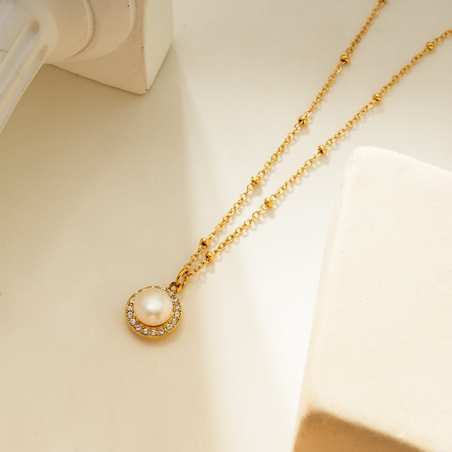 LATAHIA Gold: Beaded Chain necklace with Freshwater Pearl & Pavé Zirconia Border Pendant