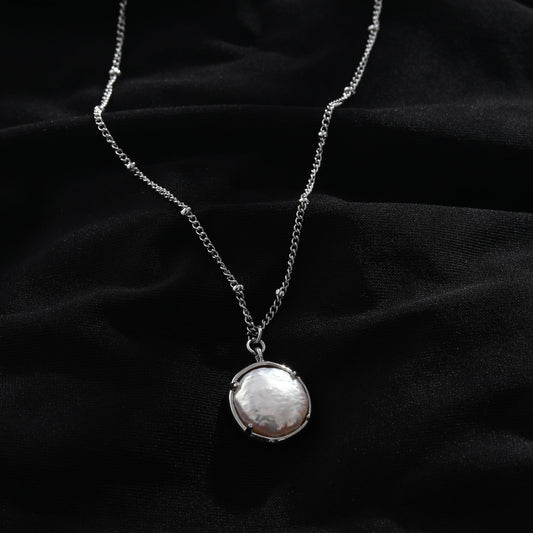 LERATI Beaded Chain with an Encased Fresh Water Pearl Pendant in Silver