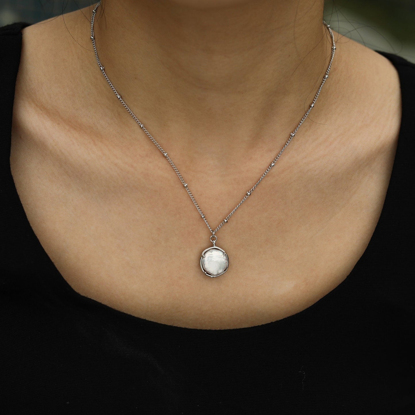 LERATI Beaded Chain with an Encased Fresh Water Pearl Pendant in Silver