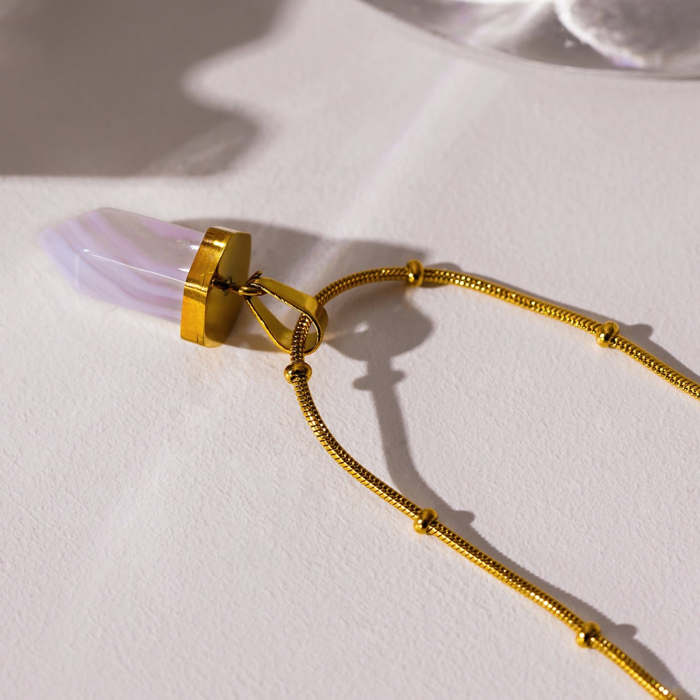 MAKEDA: Amethyst Stone Pendant Anchored on a Beaded Snake Skin Textured Chain Necklace