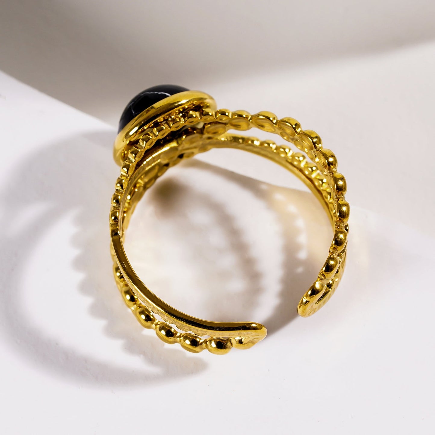 MALAYA: Cross Over Stacked Ring with a Black Turquoise Stone Centrepiece