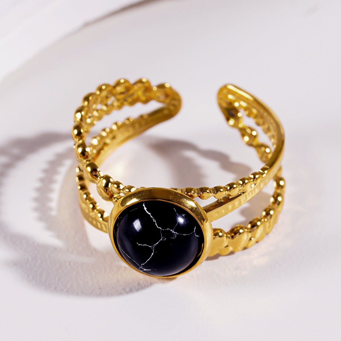 MALAYA: Cross Over Stacked Ring with a Black Turquoise Stone Centrepiece
