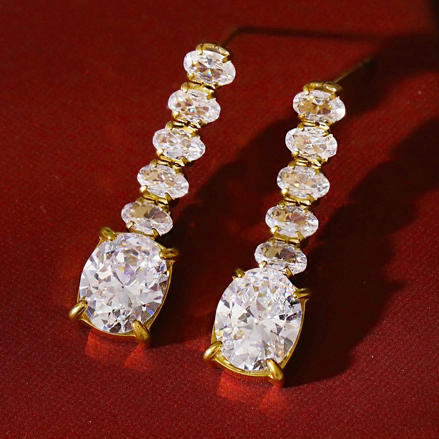 MALIA: Radiant Cascading Zirconia Drop Earrings