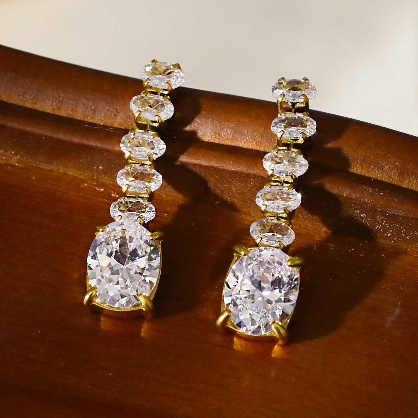 MALIA: Radiant Cascading Zirconia Drop Earrings