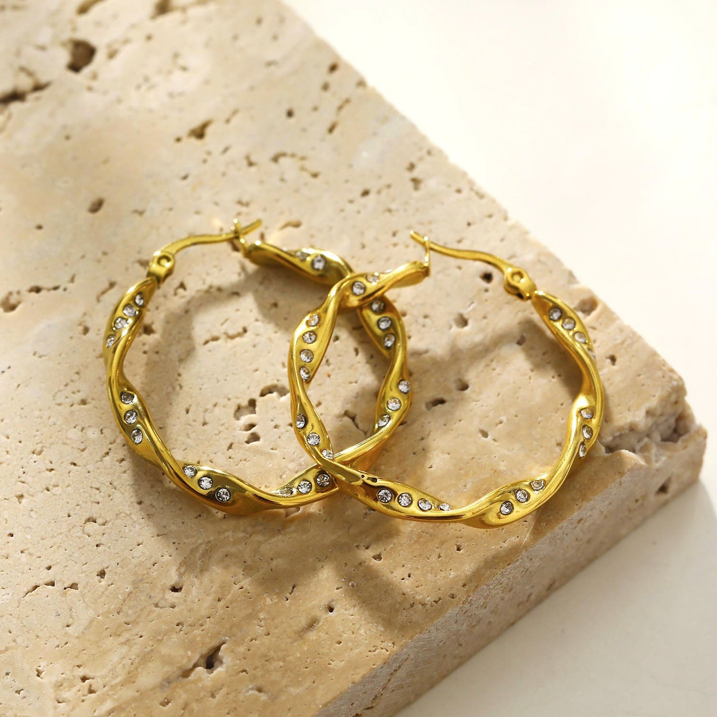 MARTHA: Twisted Hoop Earrings with Zirconia Embellished Sides