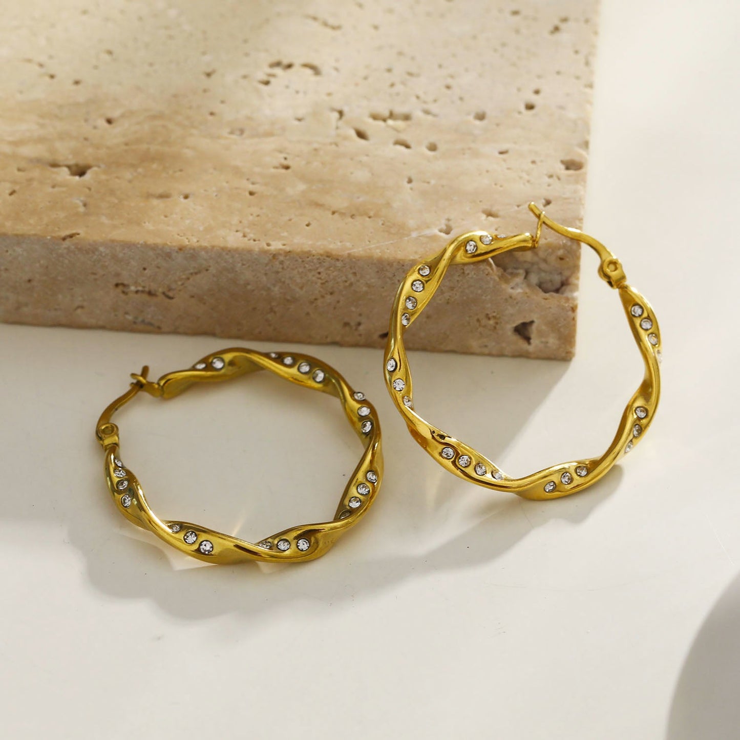 MARTHA: Twisted Hoop Earrings with Zirconia Embellished Sides