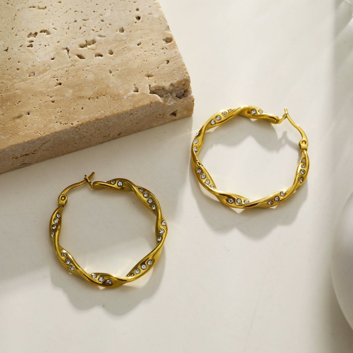 MARTHA: Twisted Hoop Earrings with Zirconia Embellished Sides