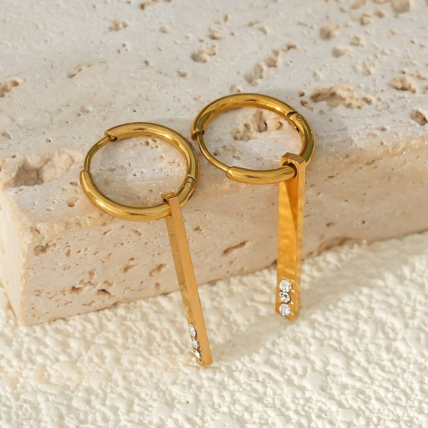 Style MAYLA: Gold Hoops with a Minimalist Charm featuring a Trio of Zirconia Gemstones