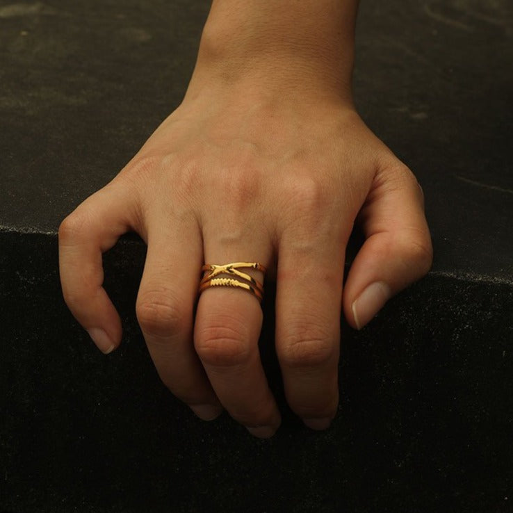 MIRANDA: Cross Over Triple Band Stacked Gold Ring