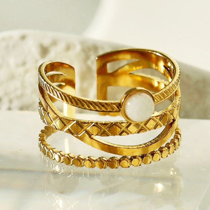 NADIA Gold: Multi Stacked Ring with a Stone Centre Piece
