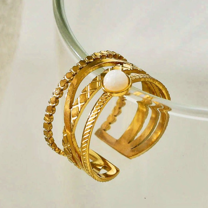 NADIA Gold: Multi Stacked Ring with a Stone Centre Piece