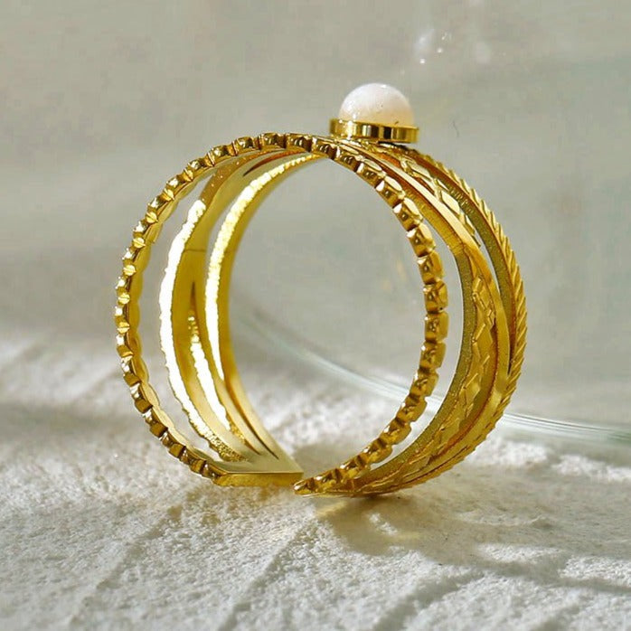 NADIA Gold: Multi Stacked Ring with a Stone Centre Piece