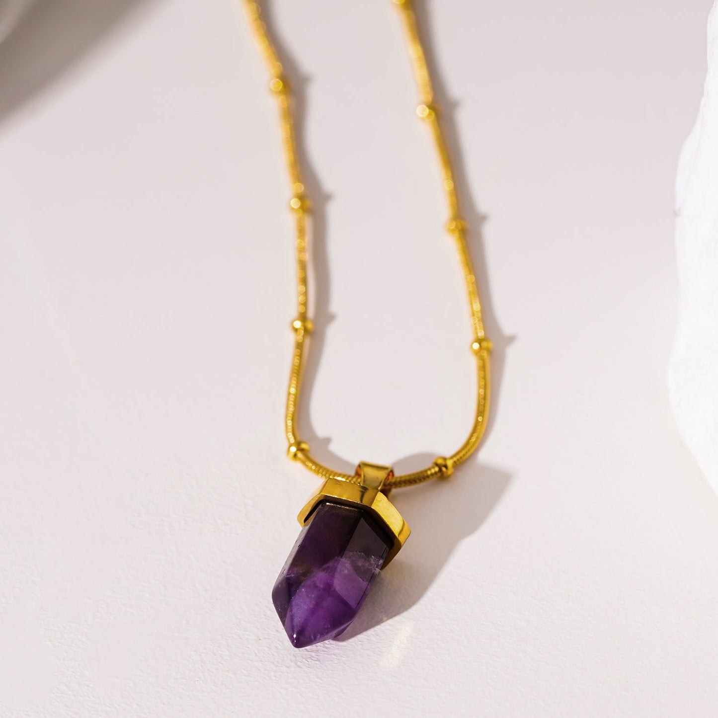 NAZINGA: Lace Agate Stone Pendant Anchored on a Beaded Snake Skin Textured Chain Necklace