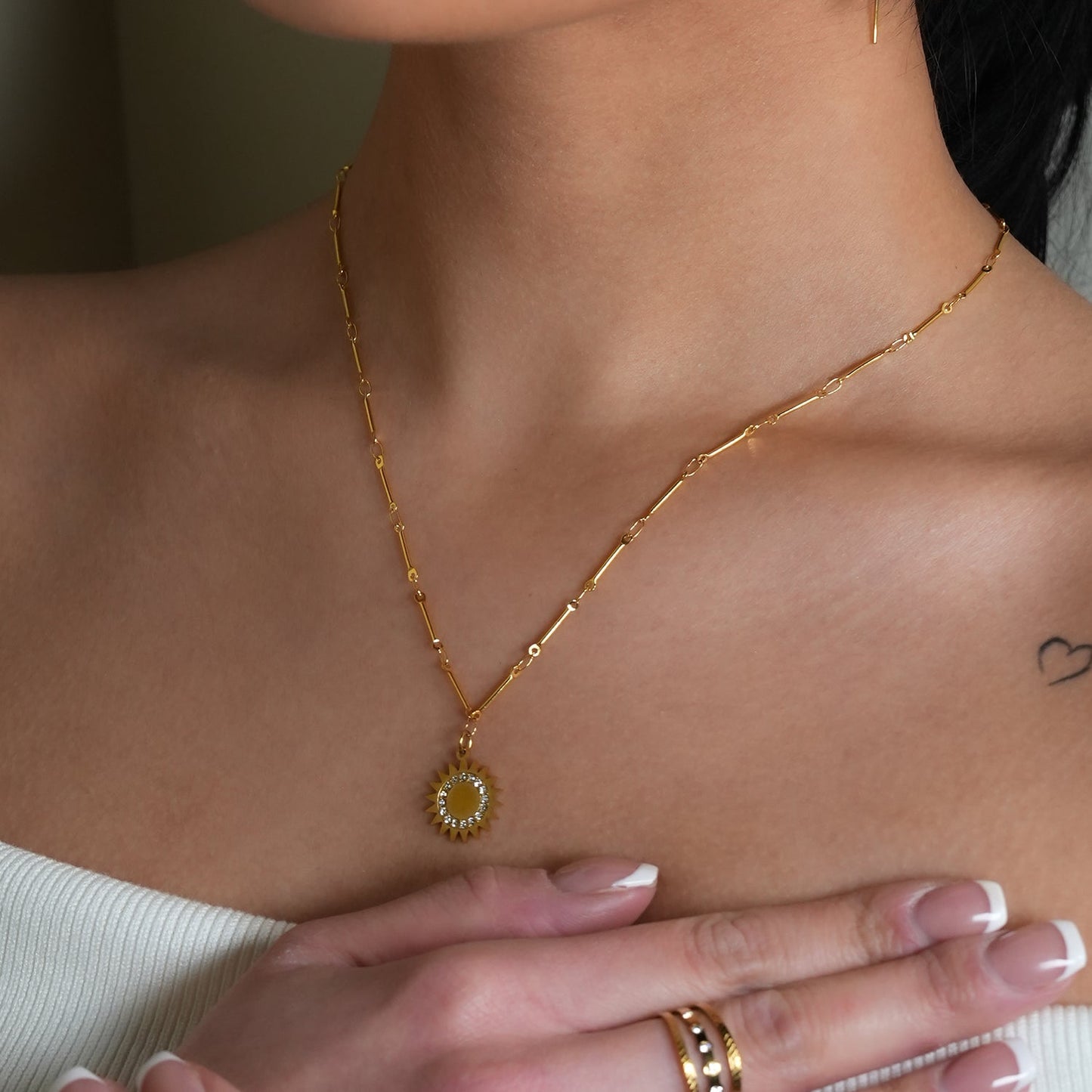 NOMIA Gold: Radiant Sunburst Pendant Zirconia Chain Necklace