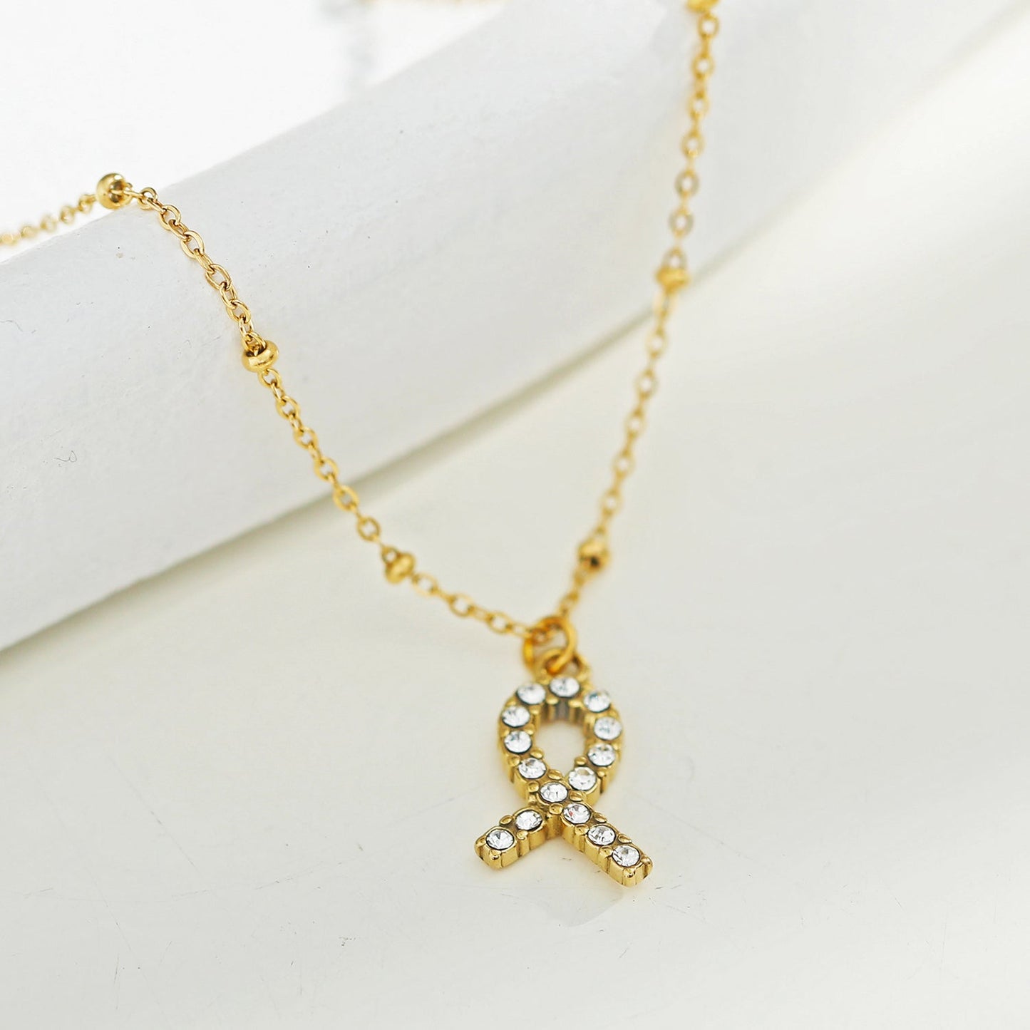 RIBBON: Cancer Fighter Pendant with a Pavé Zirconia Ribbon in Gold