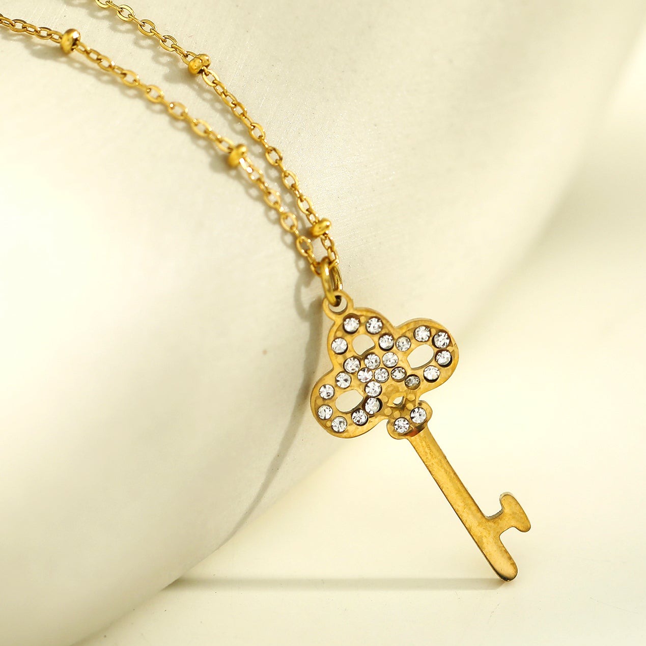 UNLOK Beaded Gold Chain with Zirconia Embellished Key Pendant