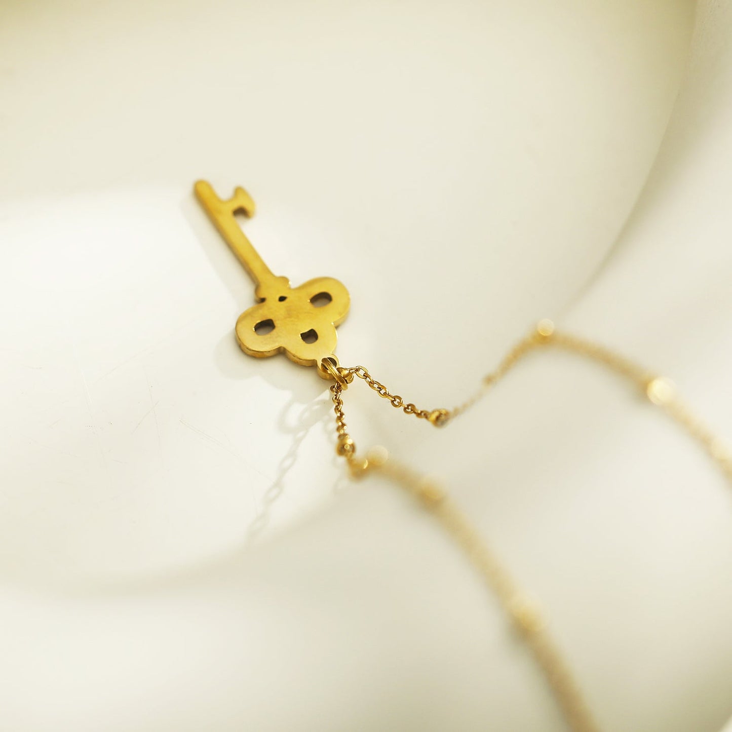 UNLOK Beaded Gold Chain with Zirconia Embellished Key Pendant