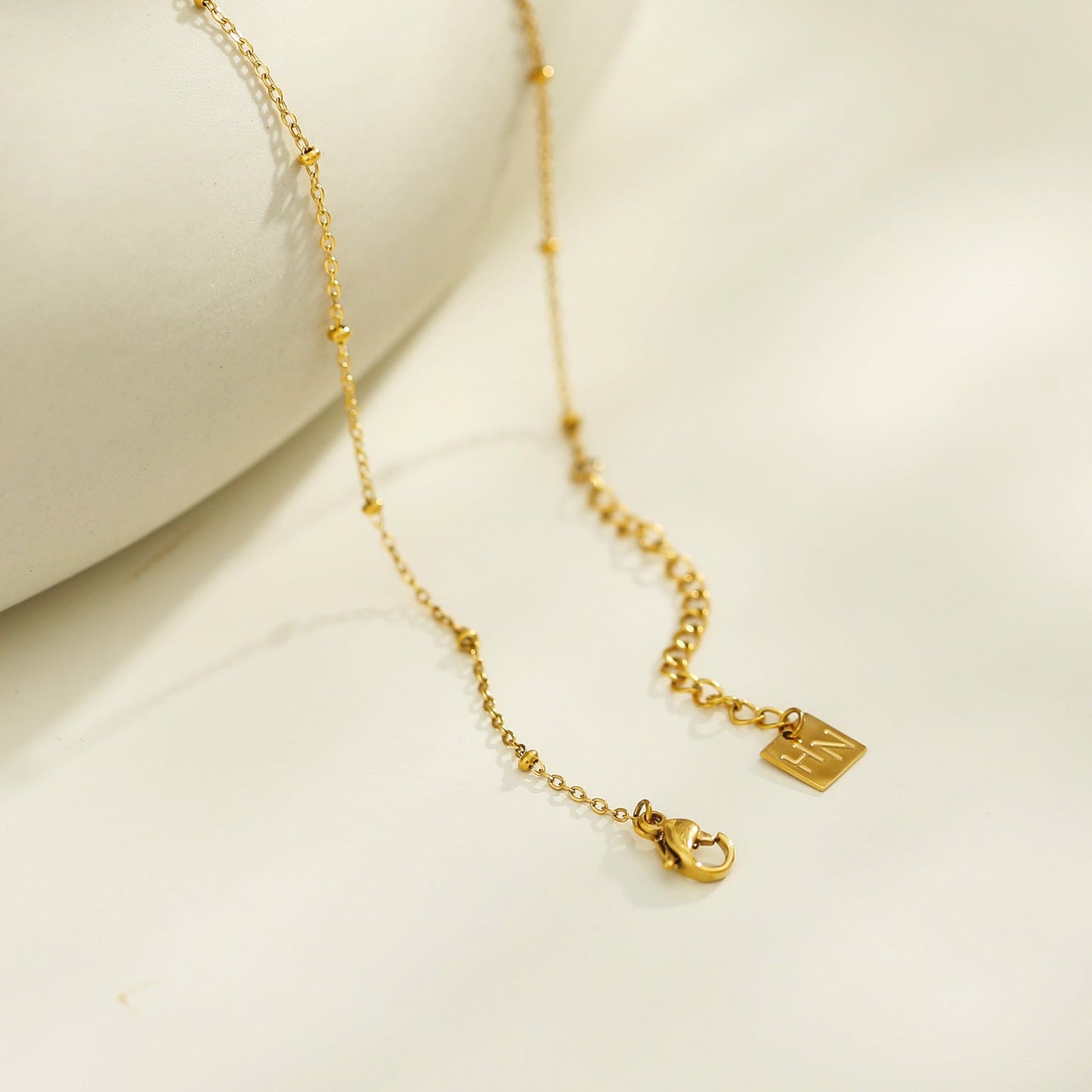 UNLOK Beaded Gold Chain with Zirconia Embellished Key Pendant