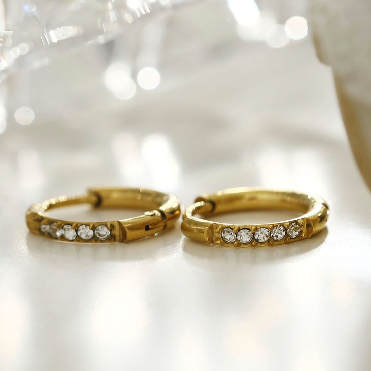 DARCI: Pavé Zirconia Gemstone Embedded Classic Mini Hoop in Gold